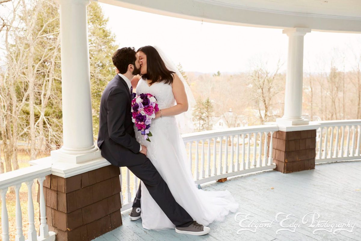 november-wedding-couple-embracing-on-veranda