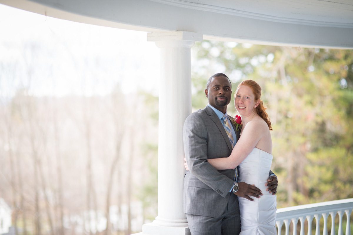 couple embracing on veranda