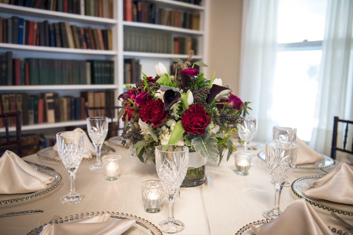 White linen and Red Roses with clear plates