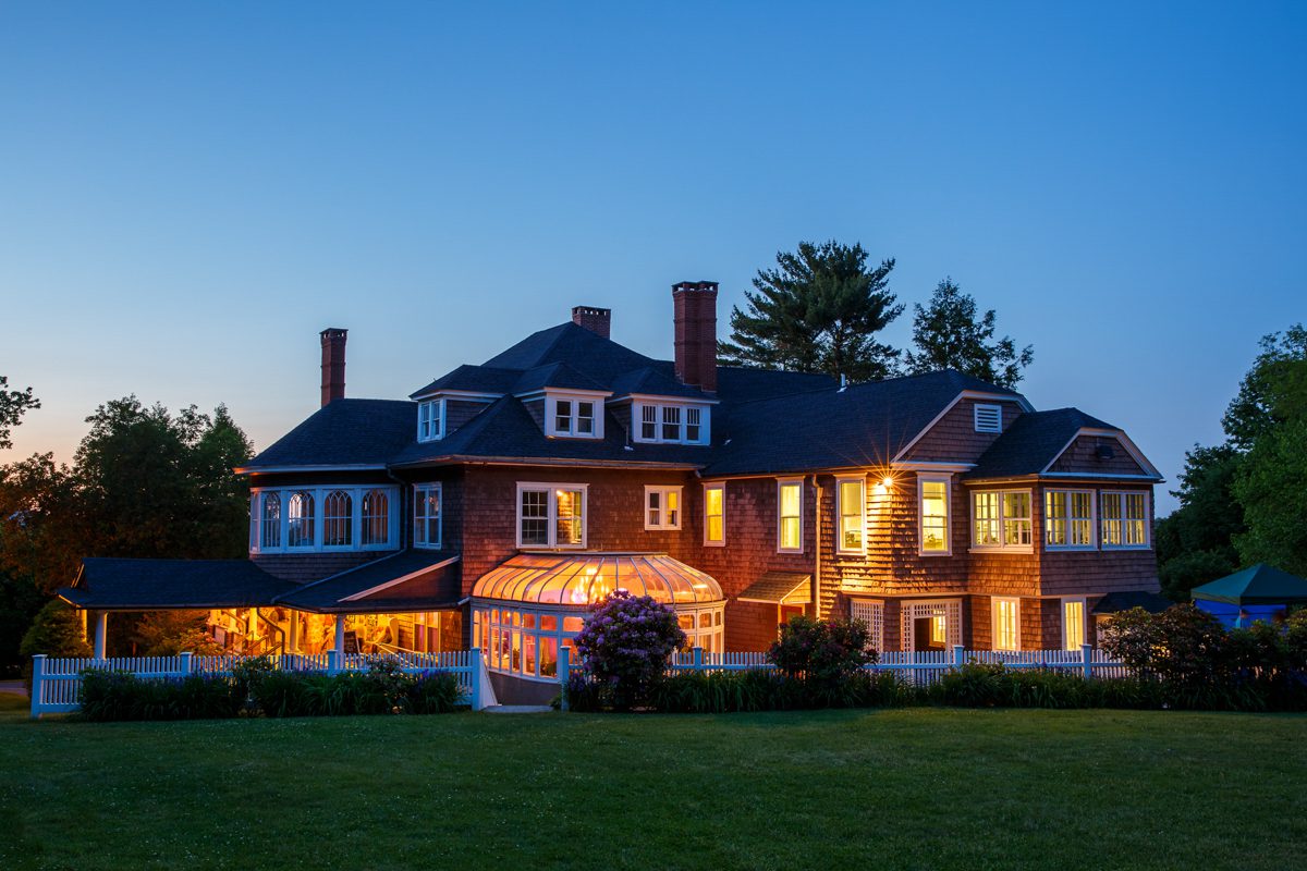 Tarrywile Mansion lit up for an evening wedding reception