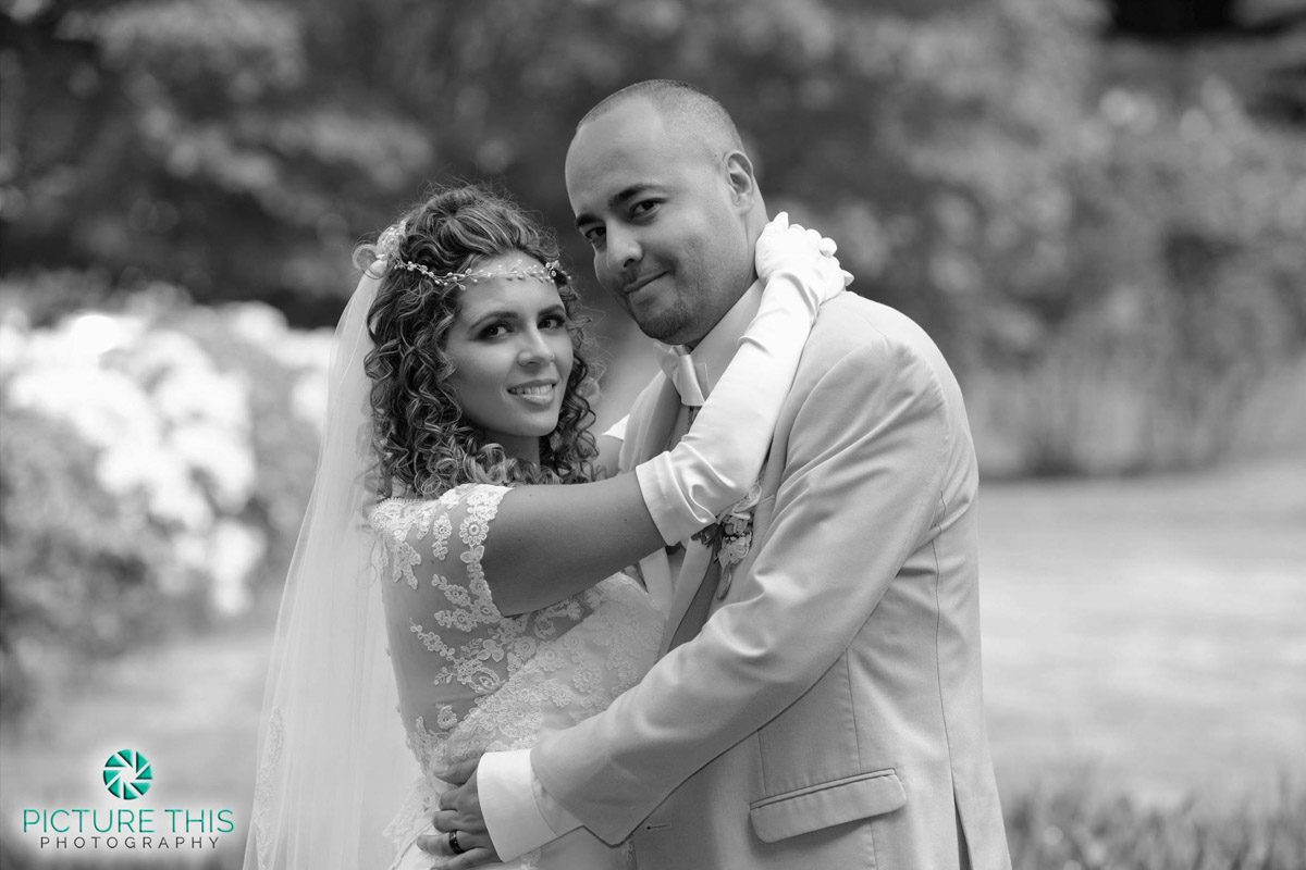 a-victorian-era-wedding-couple-embracing-looking-forward