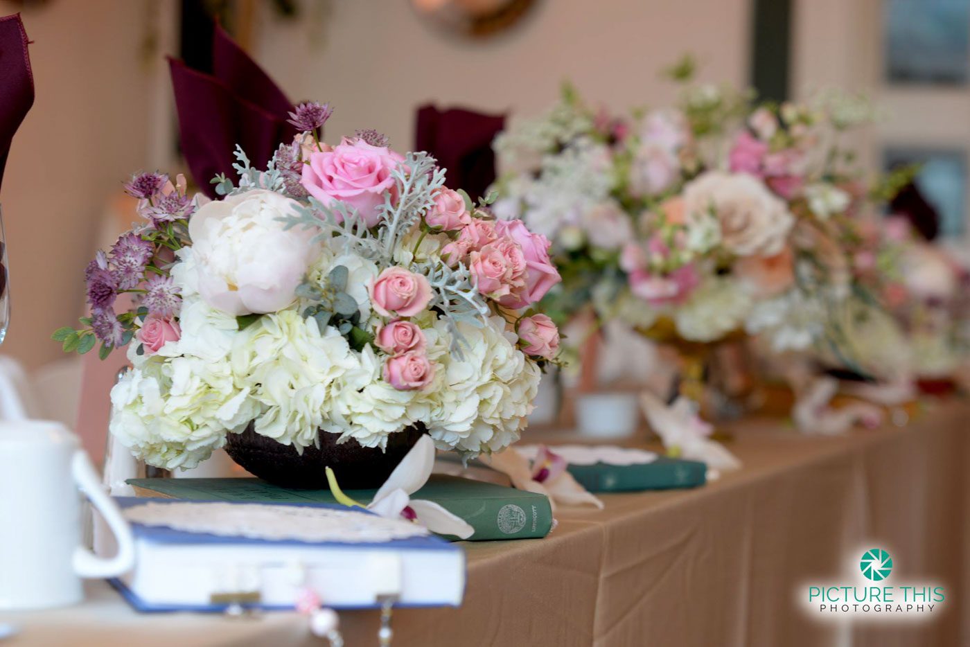 immaculate-alumni-wedding-head-table-decorations