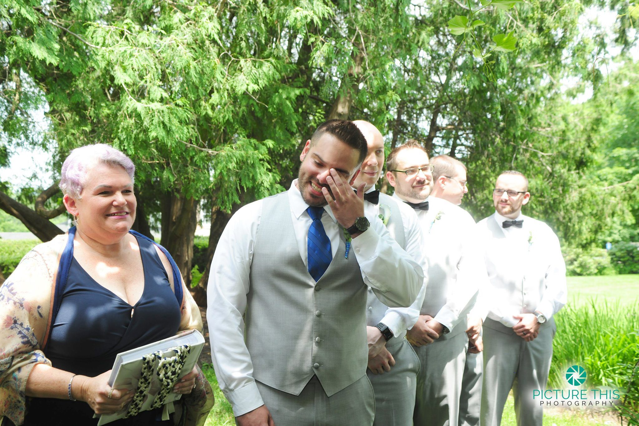 late-june-wedding-ceremony-groom-tears-up-at-sight-of-bride