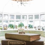 books-stacked-with-wedding-rings-on-top