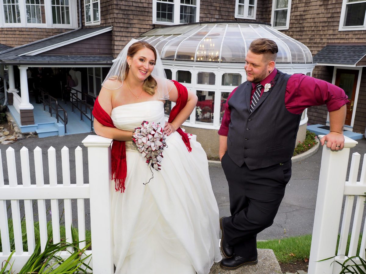 mandy and scott posing in front of the conservatory