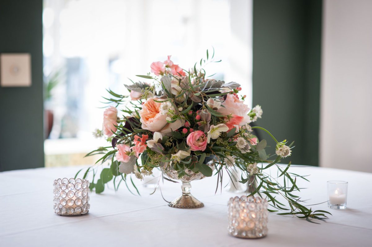 soft pink roses with peach peonies in a crystal bowl