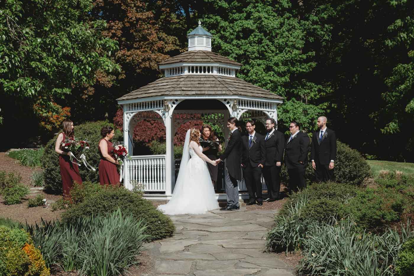 gazebo-wedding-ceremony-with-bride-groom-jp-and-wedding-party